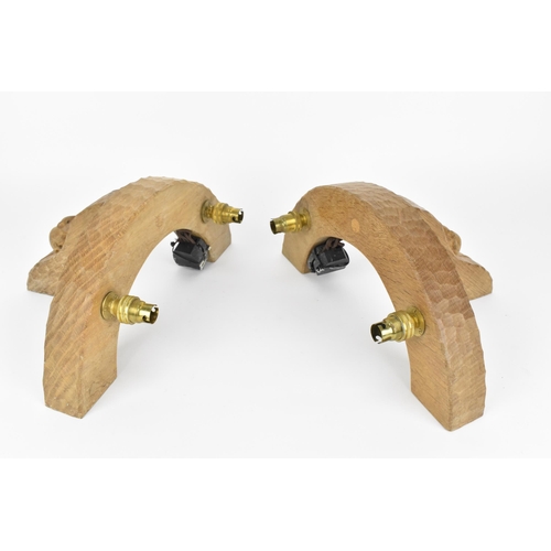 1 - Robert Thompson of Kilburn (1876-1955) Mouseman- a pair of carved oak twin wall-lights, or arched fo... 