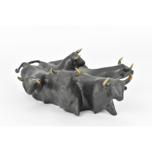 86 - Jill Cowie Sanders (b. 1930) 
patinated bronze sculpture of herd of bulls, , no. 10 out of 35, signe... 