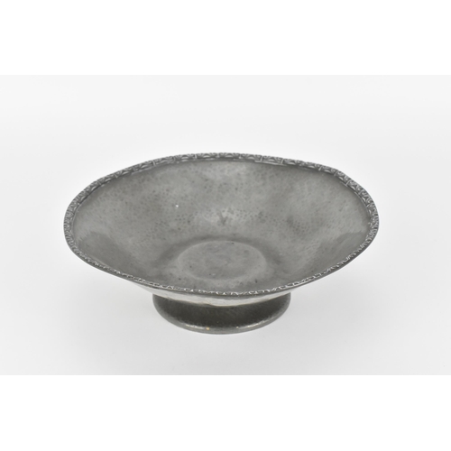 89 - A Liberty of London pewter bowl on stand, of circular form with hammered effect throughout, on a spr... 