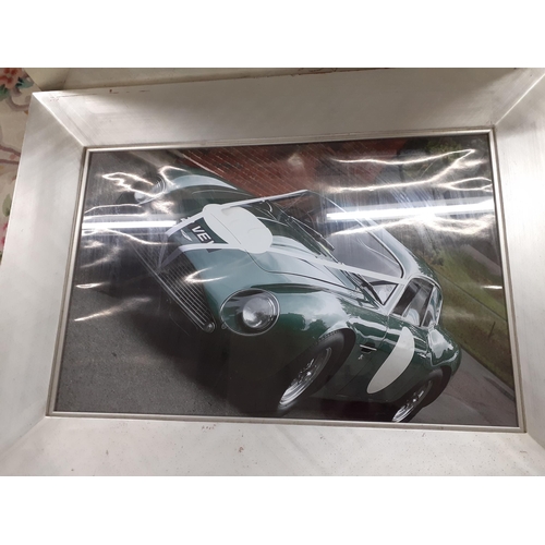 Two large framed photographs of an Aston Martin and Zagato in