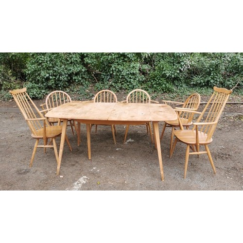 301 - A set of four Ercol windsor carvers, together with a pair of tall back Ercol armchairs, and a blonde... 