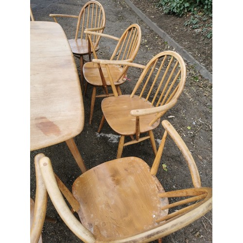 301 - A set of four Ercol windsor carvers, together with a pair of tall back Ercol armchairs, and a blonde... 