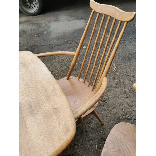 301 - A set of four Ercol windsor carvers, together with a pair of tall back Ercol armchairs, and a blonde... 