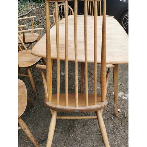 301 - A set of four Ercol windsor carvers, together with a pair of tall back Ercol armchairs, and a blonde... 