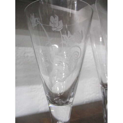 196 - A set of 8 Dartington 'Gertrude Herres' pedestal wine glasses etched with images of flora
Location: ... 