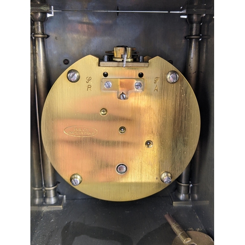 14 - An early 20th century brass lantern clock, in the 18th century style the four post case with 5