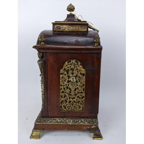 18 - A late 19th/early 20th century mahogany bracket clock, the case having basket of flowers finials, gi... 