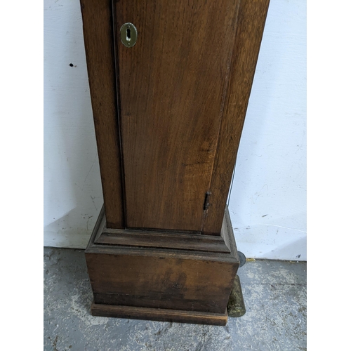 20 - An 18th century oak cased 30 hour longcase clock, the case having a stepped and dental moulded corni... 