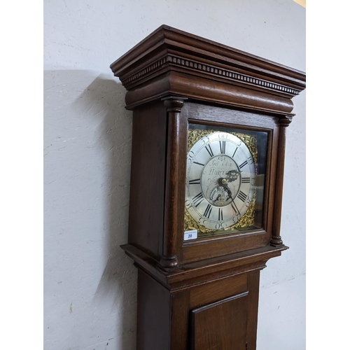 20 - An 18th century oak cased 30 hour longcase clock, the case having a stepped and dental moulded corni... 