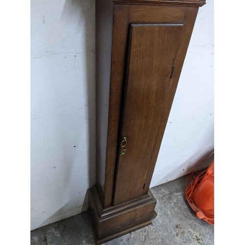 20 - An 18th century oak cased 30 hour longcase clock, the case having a stepped and dental moulded corni... 