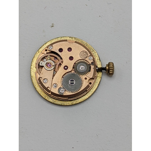 21 - A Omega manual wind ladies 14ct gold wristwatch, circa 1973, having a gilt dial with Arabic numerals... 