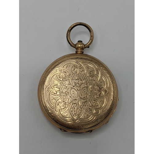 24 - A Victorian 14ct gold, open faced fob watch, having a gilt engraved floral dial, blued hands and Rom... 