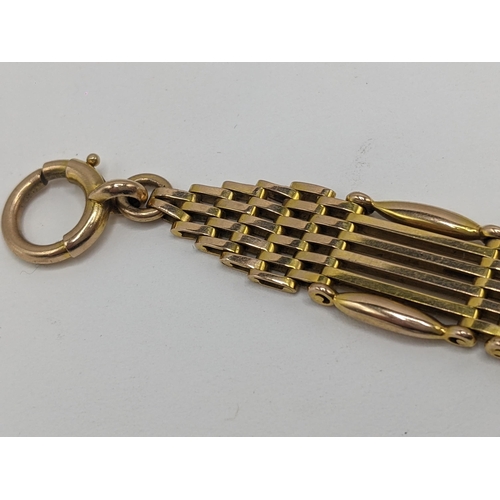 29 - A early 20th century 15ct gold gate link fob watch chain with 15ct O clip and dog clip, 13.5cm, tota... 
