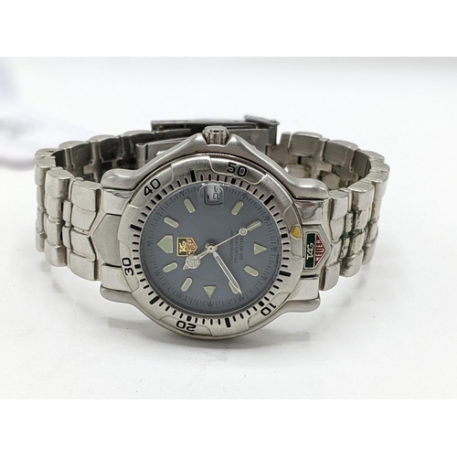 33 - A Tag Heuer automatic, gents stainless steel wristwatch, having a pale blue dial signed Chronometer ... 