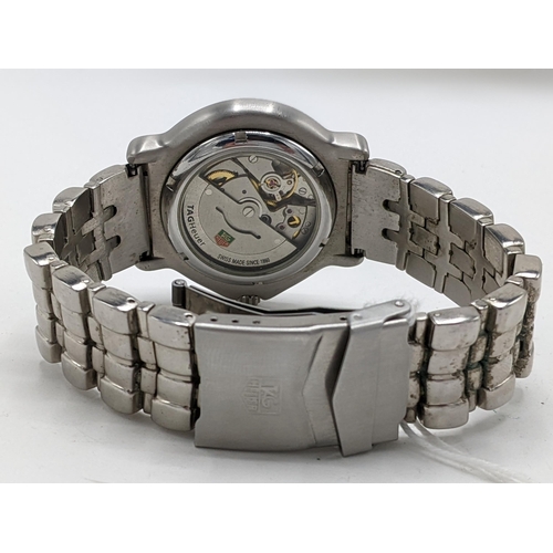33 - A Tag Heuer automatic, gents stainless steel wristwatch, having a pale blue dial signed Chronometer ... 