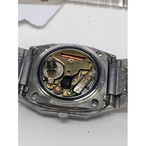 35 - A Rado quartz, stainless steel cased wristwatch, having a silvered dial signed Rado, with centre sec... 