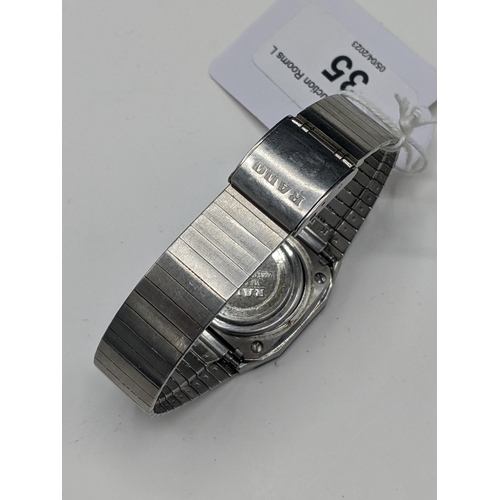 35 - A Rado quartz, stainless steel cased wristwatch, having a silvered dial signed Rado, with centre sec... 