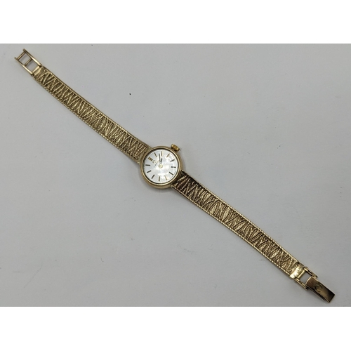 44 - An Omega manual wind, ladies 9ct gold wristwatch, circa 1966, having a silvered dial with baton mark... 