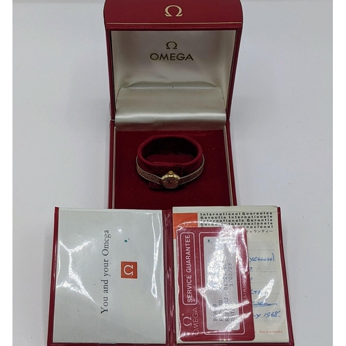 44 - An Omega manual wind, ladies 9ct gold wristwatch, circa 1966, having a silvered dial with baton mark... 