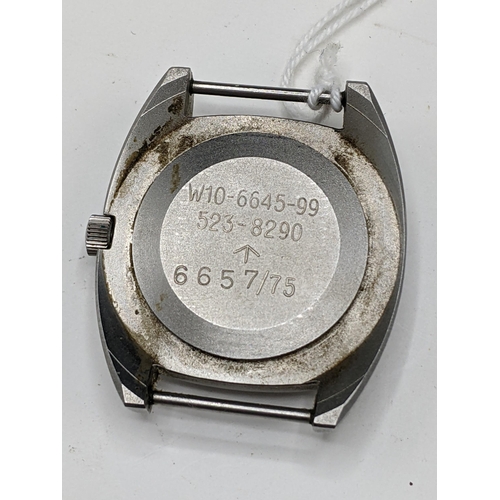 49 - A Hamilton, W10 military issued, gents, stainless steel wristwatch, having a black dial with centre ... 