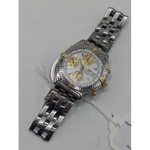 63 - A Breitling Chronomat chronograph gents, automatic, stainless steel wristwatch with white dial, bato... 