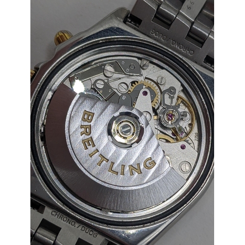 63 - A Breitling Chronomat chronograph gents, automatic, stainless steel wristwatch with white dial, bato... 