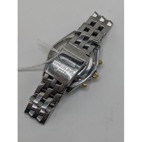 63 - A Breitling Chronomat chronograph gents, automatic, stainless steel wristwatch with white dial, bato... 