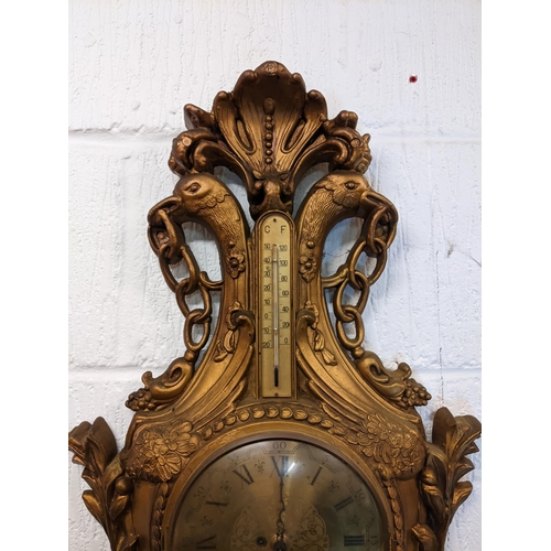 8 - A mid 20th century French Louis XVI style wall hanging clock, the carved gilt wood case having a she... 