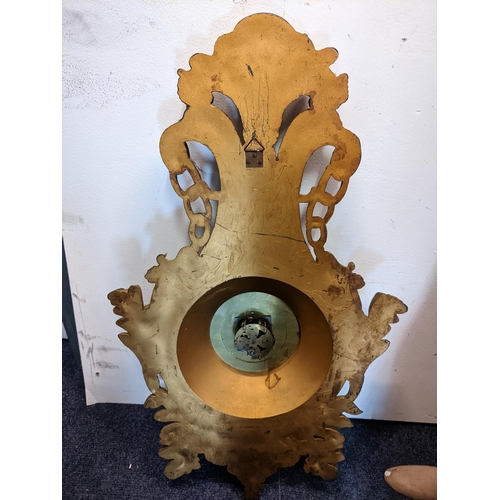 8 - A mid 20th century French Louis XVI style wall hanging clock, the carved gilt wood case having a she... 