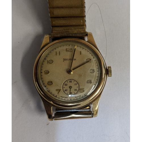 129 - A 1940-50s Helvetia 9ct gold cased hand wound wristwatch (working), dial with gold coloured Arabic n... 