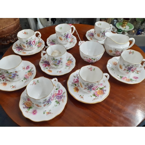 145 - A set of eight 'Derby Posies' coffee cans with matching saucers, a sugar bowl and a milk jug
Locatio... 