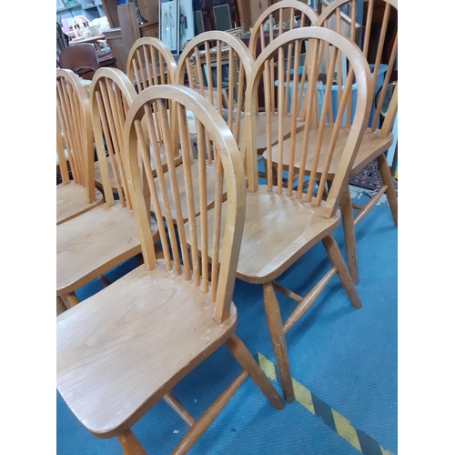 15 - A set of eight Ercol inspired elm and beech stick back chairs Location: RAF