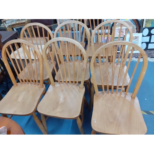 15 - A set of eight Ercol inspired elm and beech stick back chairs Location: RAF