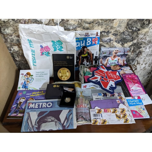 162 - Olympic London 2012 memorabilia to include a cased silver proof £2 coin, box containing various pin ... 