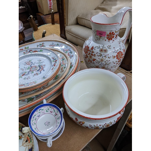 164 - A mixed lot of Victorian and later ceramics to include turkey and meat platters, part wash set, two ... 