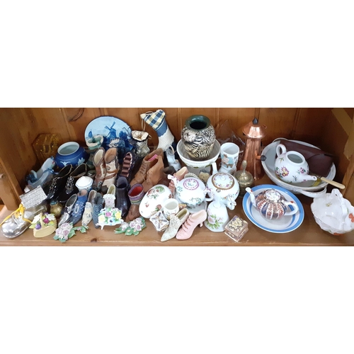 214 - A collection of shoe ornaments and other collectables to include V&A Museum collectable  teapots, We... 