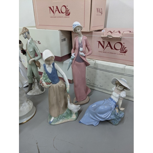 219 - Four boxed Nao Lladro figurines, together with a boxed Nadal figurine, a Lladro Nao Daisa 1987 Girl ... 