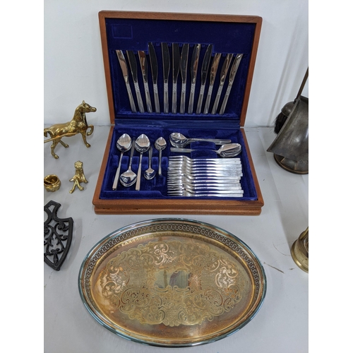 220 - A mixed lot of metalware to include a fine side set, a brass horse and cart, canteen of cutlery, a T... 