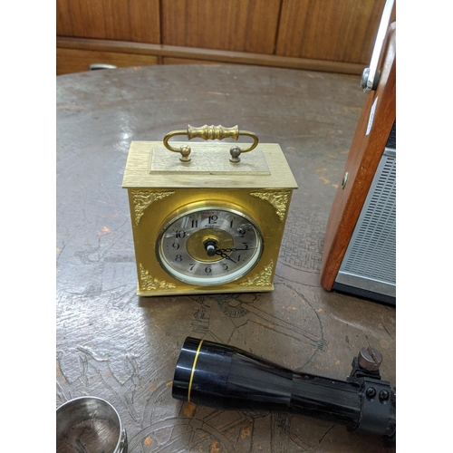 230 - A mixed lot to include a Nikko Stirling gun sight 4x32, a silver plated and enamelled napkin ring, c... 