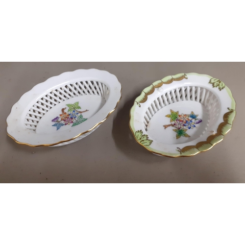 248 - A pair of small oval Herend baskets with floral decoration, a Russian china figure of a lady holding... 