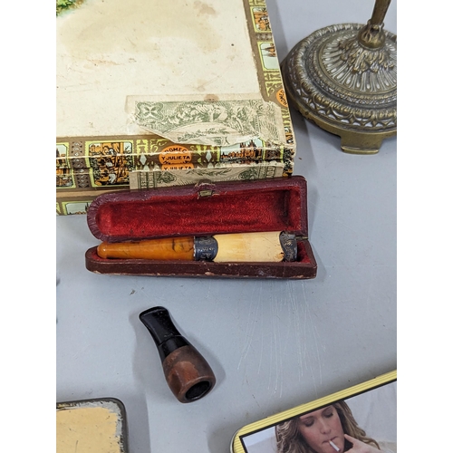 253 - Mixed smoking related items to include cigar box and tin, leather holders, leather embossed vesta ca... 