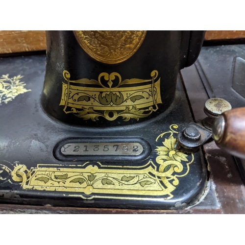 262 - A Victorian oak collection/post box with glazed door having a Longfellow poem to the glazing, on pli... 