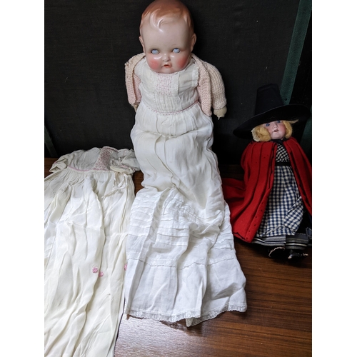 263 - An early 20th century Armand Marseille bisque headed doll, Germany 390 a 610M, blue sleeping eyes, o... 