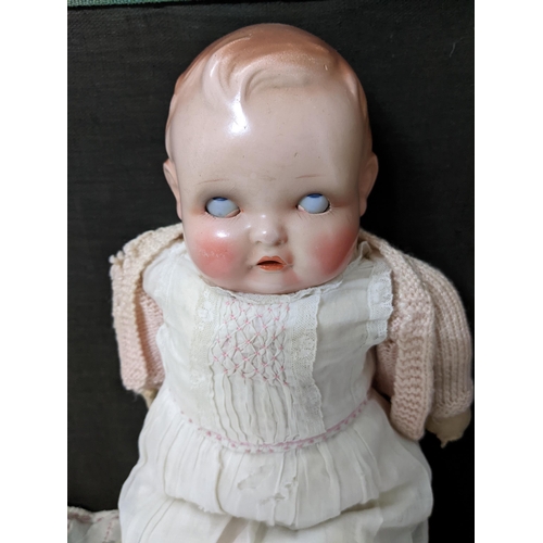 263 - An early 20th century Armand Marseille bisque headed doll, Germany 390 a 610M, blue sleeping eyes, o... 