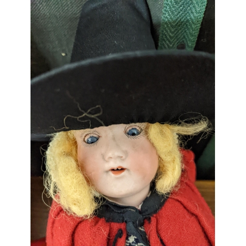 263 - An early 20th century Armand Marseille bisque headed doll, Germany 390 a 610M, blue sleeping eyes, o... 