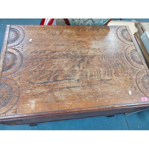 287 - An early 20th century oak carved octagonal topped fall flap table having a singe inset drawer, 74cm ... 