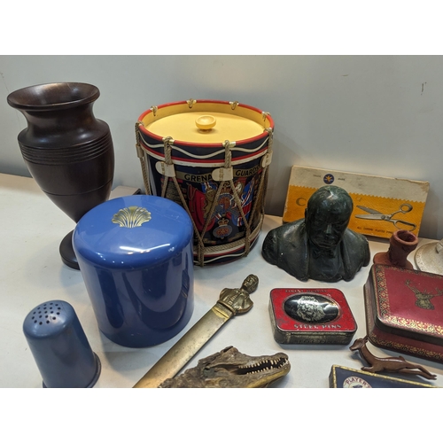 303 - A mid lot to include a Boer War 1900 South Africa chocolate tin, composition bust of Sir Winston Chu... 