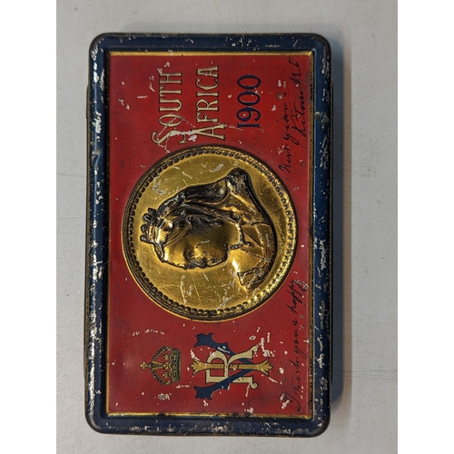 303 - A mid lot to include a Boer War 1900 South Africa chocolate tin, composition bust of Sir Winston Chu... 