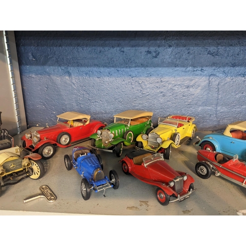 309 - A collection of metal scratch built model cars to include Mercedes, together with a Schuco Mercedes ... 