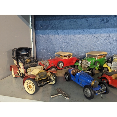 309 - A collection of metal scratch built model cars to include Mercedes, together with a Schuco Mercedes ... 